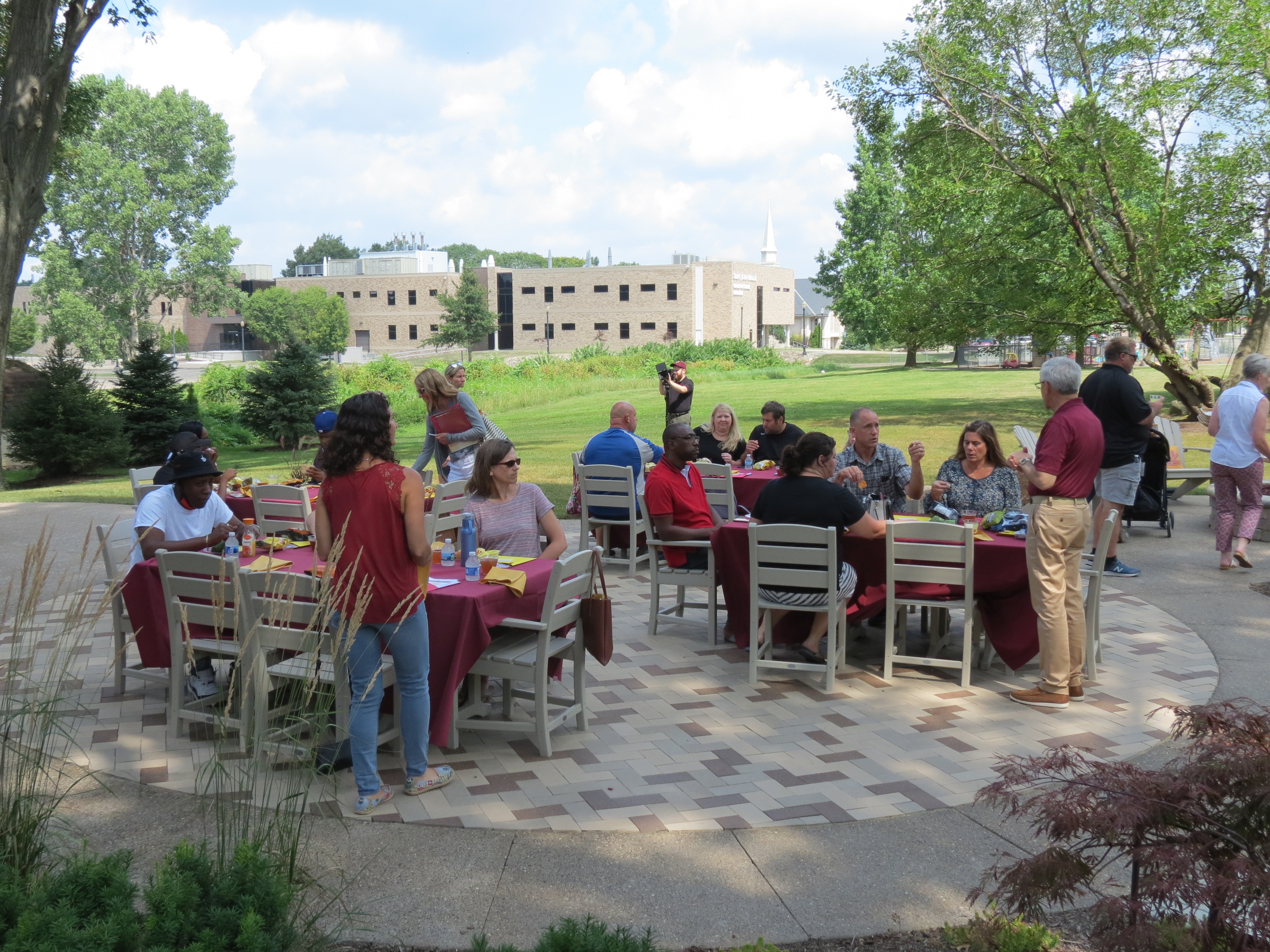 photo: Parents gathered on the back patio of the Cav House